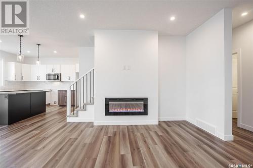 223 Prasad Manor, Saskatoon, SK - Indoor With Fireplace