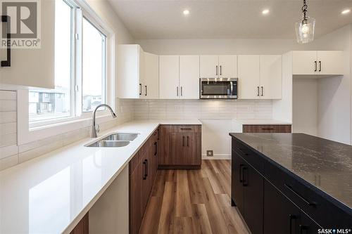 223 Prasad Manor, Saskatoon, SK - Indoor Photo Showing Kitchen With Double Sink