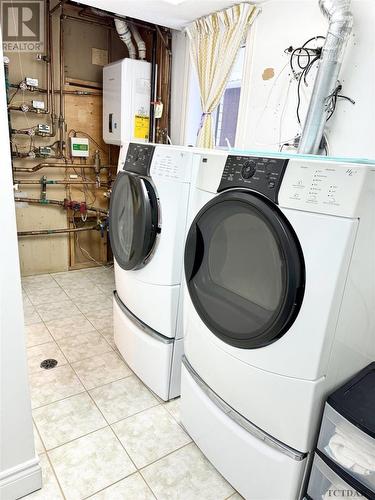 121 St-Aubin Ave, Moonbeam, ON - Indoor Photo Showing Laundry Room