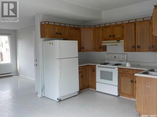 413 Idylwyld Drive N, Saskatoon, SK - Indoor Photo Showing Kitchen With Double Sink