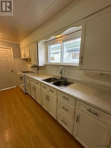 114 Rebecca St, Temiskaming Shores, ON - Indoor Photo Showing Kitchen With Double Sink
