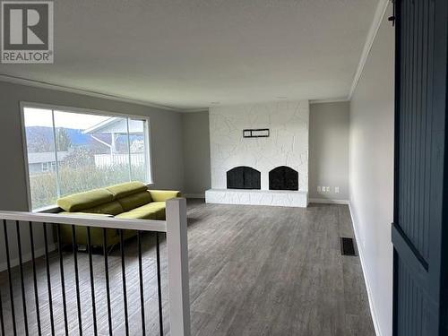 5723 Richards Crescent, Vernon, BC - Indoor With Fireplace