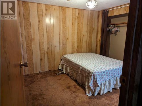 23 25 Century Trailer Court, Mackenzie, BC - Indoor Photo Showing Bedroom
