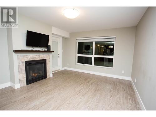 126 2055 Ingledew Street, Prince George, BC - Indoor Photo Showing Living Room With Fireplace