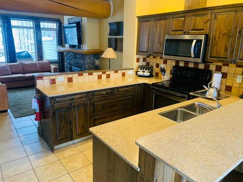 O2-A - 1351 Gerry Sorensen Way, Kimberley, BC - Indoor Photo Showing Kitchen With Double Sink