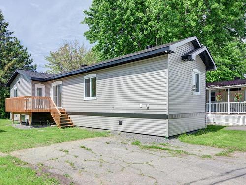 Frontage - 569 29E Avenue Du Domaine, Sainte-Marthe-Sur-Le-Lac, QC - Outdoor With Deck Patio Veranda With Exterior