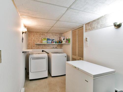 Salle de lavage - 256 Mtée Sanche, Rosemère, QC - Indoor Photo Showing Laundry Room
