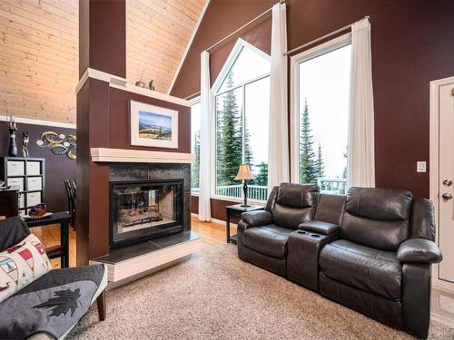 1-600 Monashee Road, Silver Star, BC - Indoor Photo Showing Living Room With Fireplace