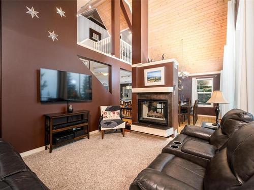 1-600 Monashee Road, Silver Star, BC - Indoor Photo Showing Living Room With Fireplace