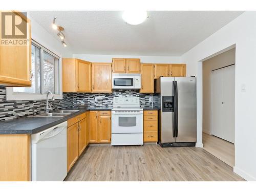 4879 Princeton Avenue, Peachland, BC - Indoor Photo Showing Kitchen With Double Sink