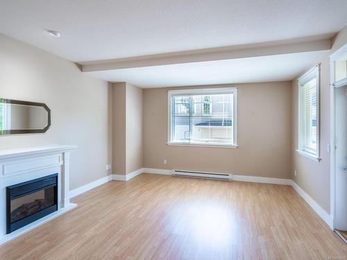 101-193 Second Ave West, Qualicum Beach, BC - Indoor With Fireplace