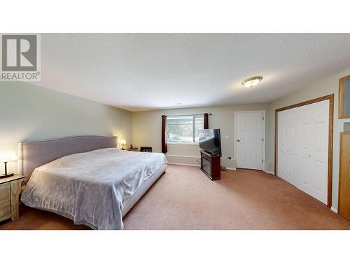 5902 Eastwood Road, 100 Mile House, BC - Indoor Photo Showing Bedroom