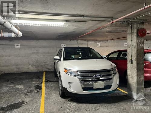 Parking Spot - 373 Laurier Avenue Unit#204, Ottawa, ON - Indoor Photo Showing Garage