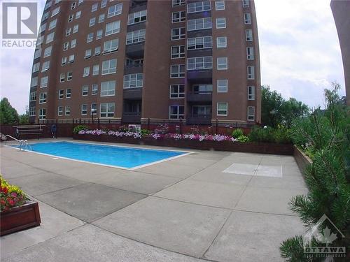 Pool - 373 Laurier Avenue Unit#204, Ottawa, ON - Outdoor With In Ground Pool With Balcony With Facade