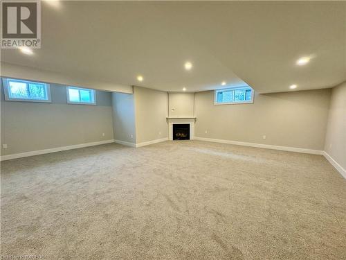 Finished basement with gas fireplace - 390 Ridge Street, Port Elgin, ON - Indoor Photo Showing Basement