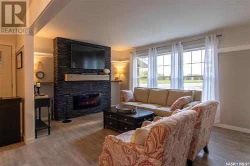 401 Short Street, Esterhazy, SK - Indoor Photo Showing Living Room With Fireplace
