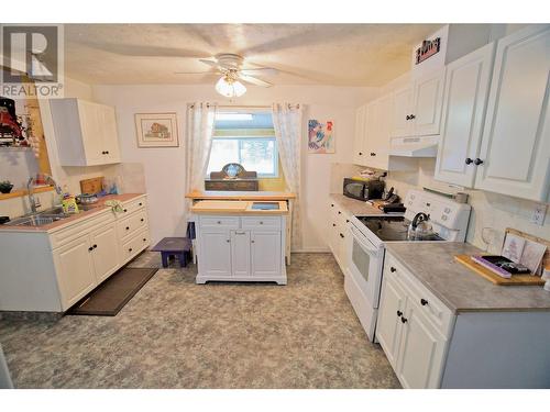 2263 Bromley Crescent, Princeton, BC - Indoor Photo Showing Kitchen With Double Sink