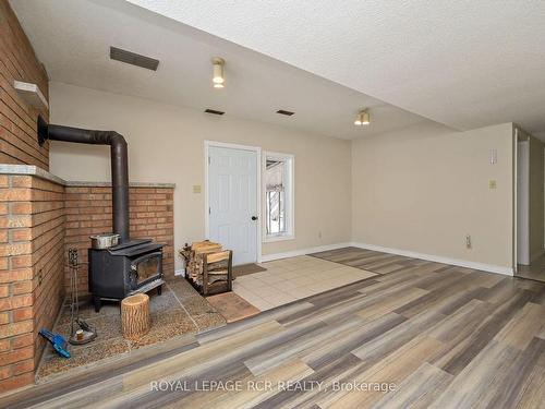 919 Guelph Rd, Centre Wellington, ON - Indoor Photo Showing Other Room With Fireplace