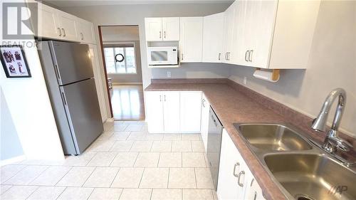 1121 Kirkman Court, Cornwall, ON - Indoor Photo Showing Kitchen With Double Sink