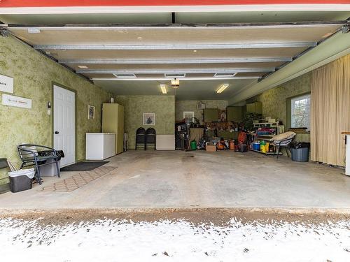 Garage - 23 Ch. Lockhart, Val-Des-Monts, QC - Indoor Photo Showing Garage