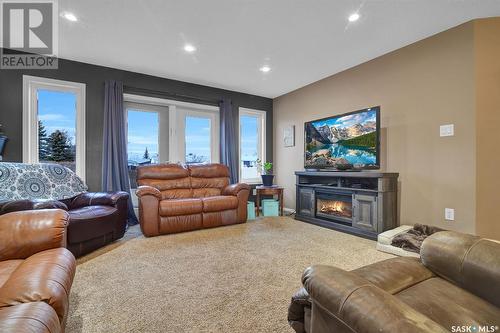 668 Riche Street, Bethune, SK - Indoor Photo Showing Living Room With Fireplace