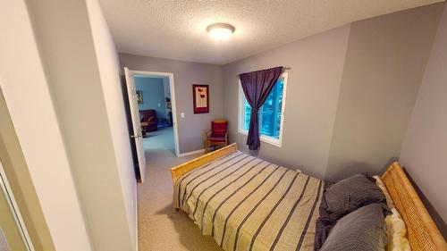 212 - 4767 Forsters Landing Road, Radium Hot Springs, BC - Indoor Photo Showing Bedroom