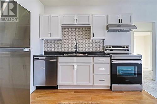 48 Eighth, Moncton, NB - Indoor Photo Showing Kitchen With Double Sink