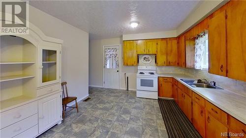 134 Holt Road, Mcnamee, NB - Indoor Photo Showing Kitchen With Double Sink