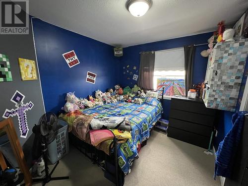 5012 46 Street, Fort Nelson, BC - Indoor Photo Showing Bedroom