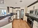 220 1621 Dakota Drive, Regina, SK  - Indoor Photo Showing Kitchen With Stainless Steel Kitchen With Upgraded Kitchen 