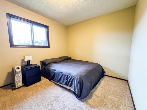 11010 Pheasant Road, Lake Country, BC - Indoor Photo Showing Bedroom
