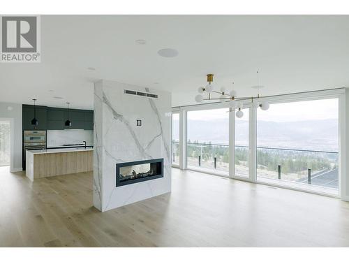 1118 Syer Road, Penticton, BC - Indoor Photo Showing Other Room With Fireplace