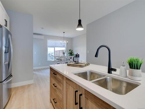 104-2120 Triangle Trail, Langford, BC - Indoor Photo Showing Kitchen With Double Sink