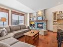 34-280 Strayhorse Road, Apex Mountain, BC  - Indoor Photo Showing Living Room With Fireplace 