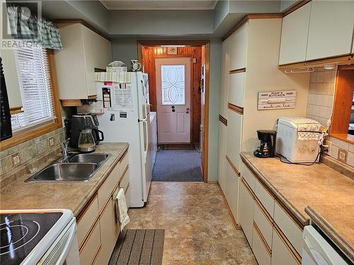 17 Ketchankookem Trail, Mindemoya, ON - Indoor Photo Showing Kitchen With Double Sink
