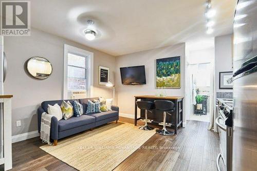 46 Elmer Ave, Toronto, ON - Indoor Photo Showing Living Room With Fireplace