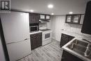 5060 Fifth Avenue E, Niagara Falls, ON  - Indoor Photo Showing Kitchen With Double Sink 