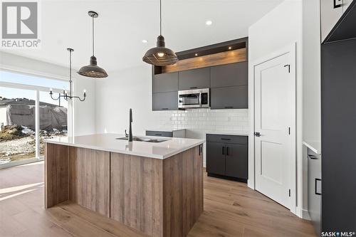 775 Delainey Court, Saskatoon, SK - Indoor Photo Showing Kitchen With Upgraded Kitchen