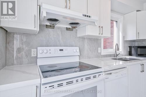 39 Roy Rainey Ave, Markham, ON - Indoor Photo Showing Kitchen With Double Sink