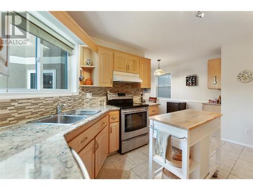 3146 Paris Street Unit# 104, Penticton, BC - Indoor Photo Showing Kitchen With Double Sink