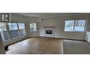 217 Elm Avenue Unit# 301, Penticton, BC  - Indoor Photo Showing Living Room With Fireplace 