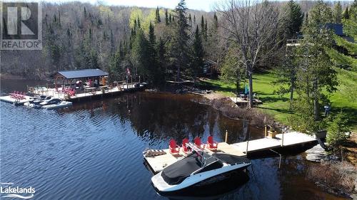 Accommodates 12+ Muskoka Chairs - 7369 Hwy 534, Restoule, ON - Outdoor With Deck Patio Veranda