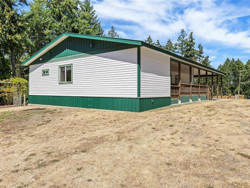 4776 Island Hwy West, Qualicum Beach, BC - Outdoor With Exterior