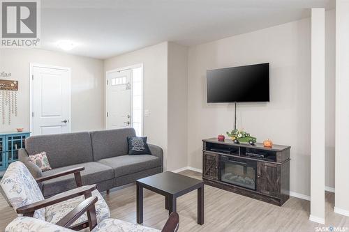 209 100 Chaparral Boulevard, Martensville, SK - Indoor Photo Showing Living Room