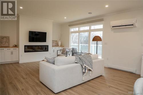 37 Mallard Lane, Coal Creek, NB - Indoor Photo Showing Living Room With Fireplace