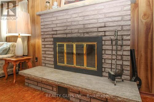 1002 Yankee Line, Smith-Ennismore-Lakefield, ON - Indoor Photo Showing Other Room With Fireplace