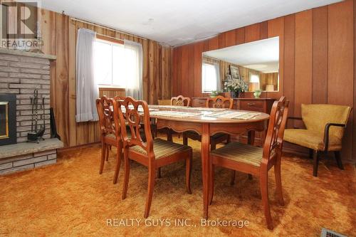 1002 Yankee Line, Smith-Ennismore-Lakefield, ON - Indoor Photo Showing Dining Room With Fireplace