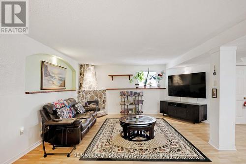 2596 Silvan Street, Niagara Falls, ON - Indoor Photo Showing Living Room With Fireplace