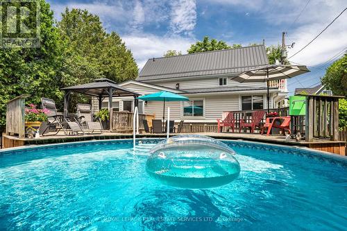 4 6Th St, Grimsby, ON - Outdoor With Above Ground Pool With Deck Patio Veranda With Backyard