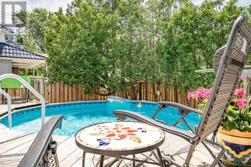 4 6Th St, Grimsby, ON - Outdoor With Above Ground Pool With Deck Patio Veranda With Backyard
